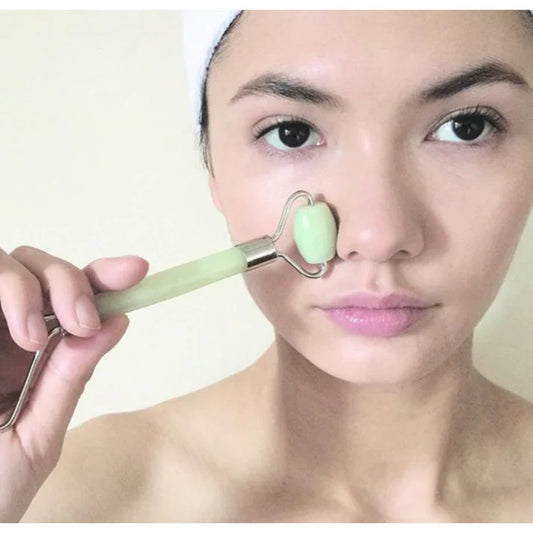 Double Head Jade Face Roller: Your At-Home Tool for Glow, De-Puffing, and Relaxation.